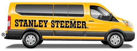 Yellow and black Stanley Steemer work truck